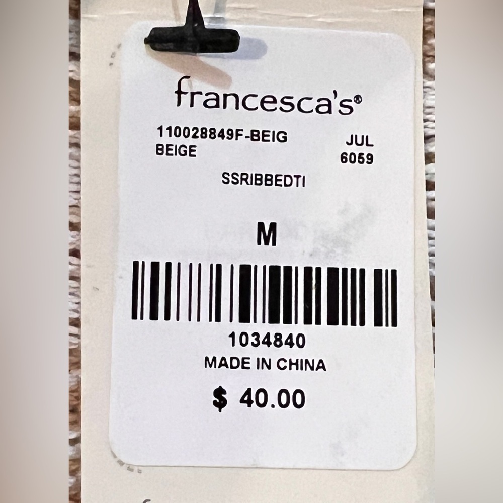 Francesca’s 
Medium
Crop Short Sleeve 
Tie front sweater
Tan/white
Herringbone - Picture 7 of 7